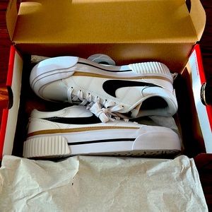 Brand new, never worn with box women’s Nike legacy lift- white, brown and black